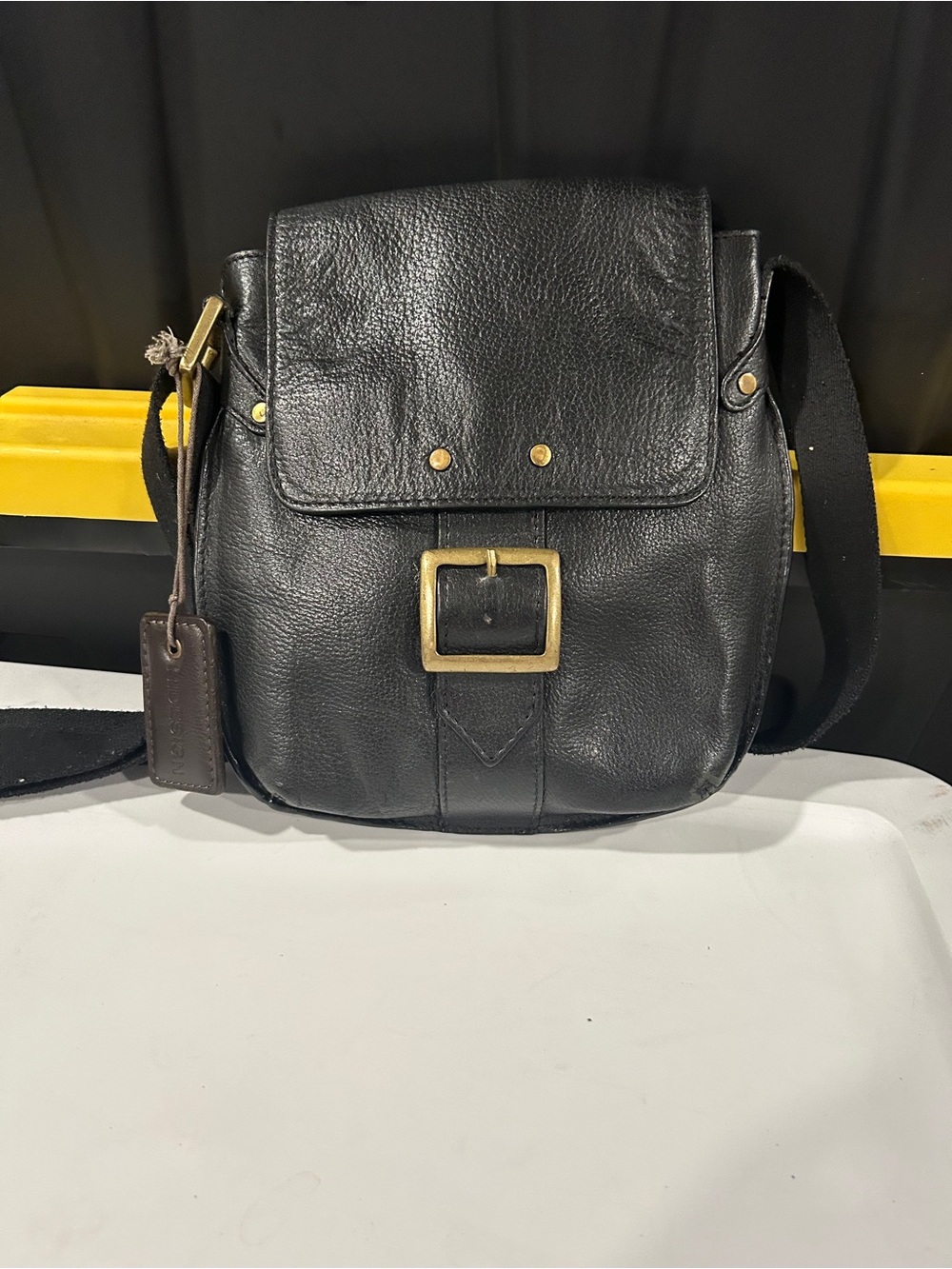 Classic Black Leather Messenger Bag with Brass Buckle